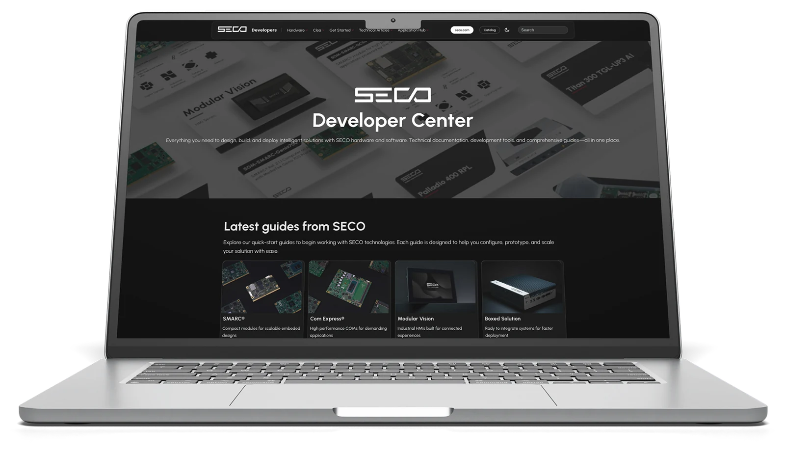 SECO Developer Center displayed on a laptop with technical guides and hardware resources.